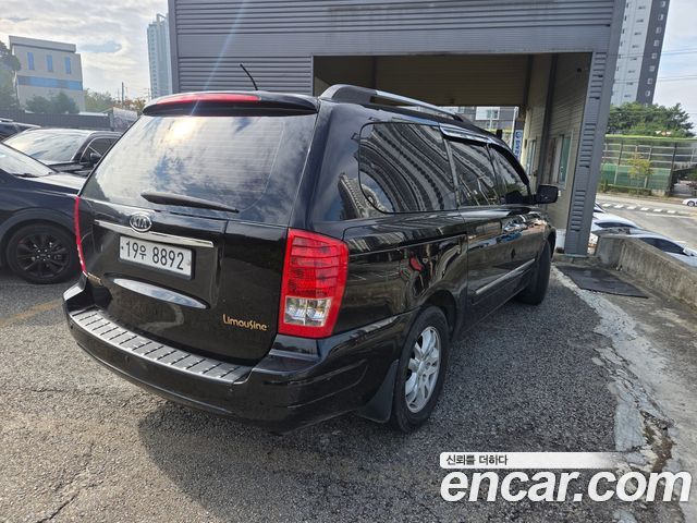 Kia Canival 2011 — photo 3
