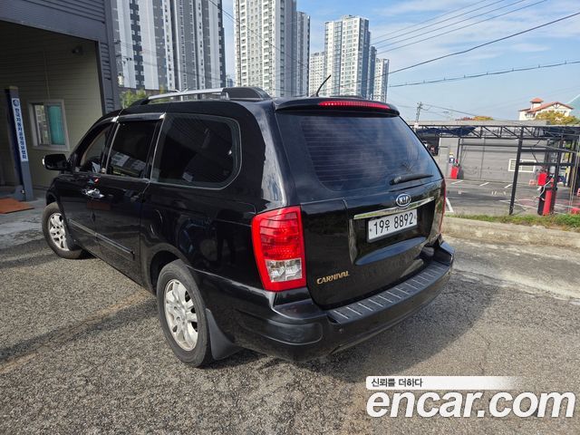 Kia Canival 2011 — photo 4