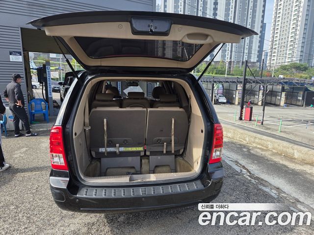 Kia Canival 2011 — photo 5