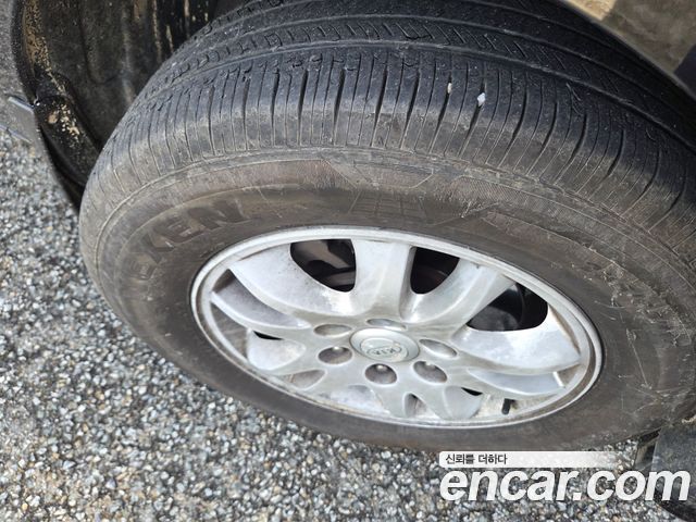 Kia Canival 2011 — photo 6