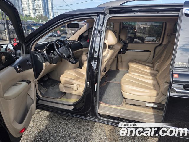 Kia Canival 2011 — photo 7