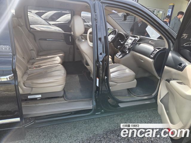 Kia Canival 2011 — photo 8