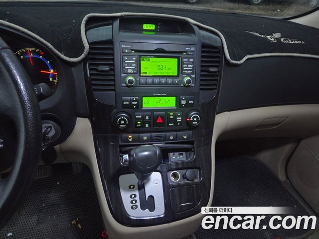 Kia Canival 2011 — photo 18