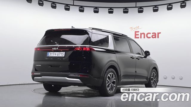 Kia Canival 2023 — photo 2