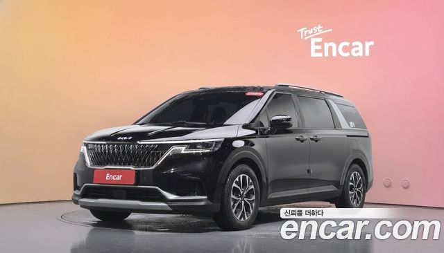 Kia Canival 2023 — photo 1