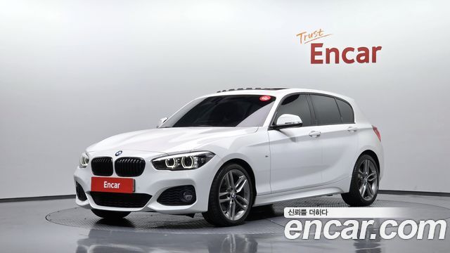BMW 1-Series 2018 — photo 1