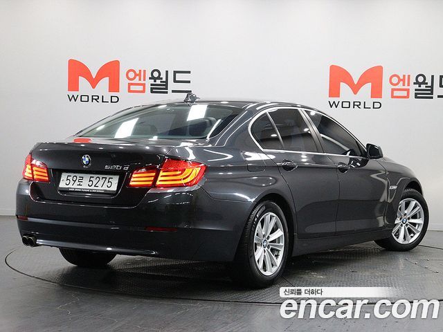 BMW 5-Series 2011 — photo 4