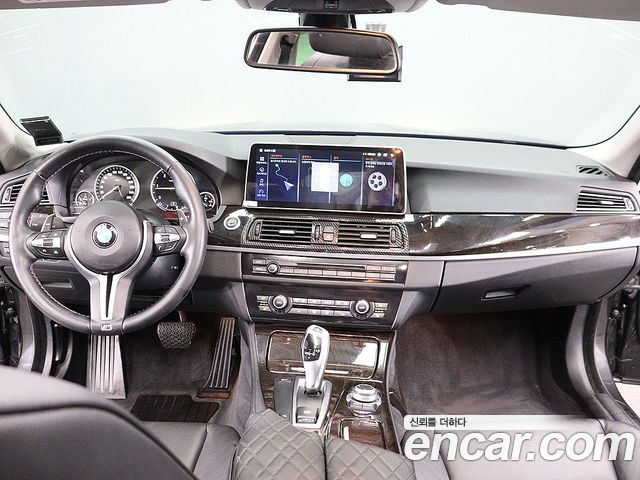 BMW 5-Series 2011 — photo 13