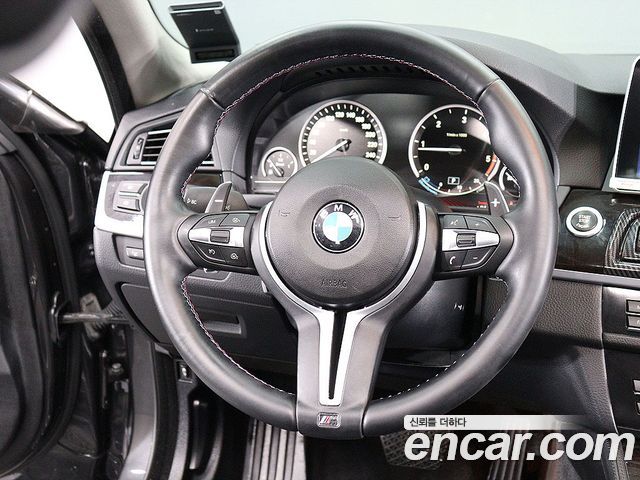 BMW 5-Series 2011 — photo 14