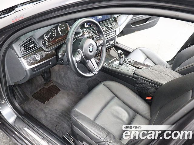 BMW 5-Series 2011 — photo 16