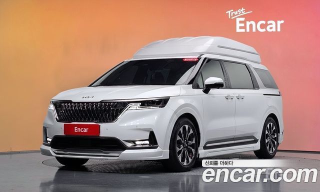 Kia Canival 2023 — photo 2