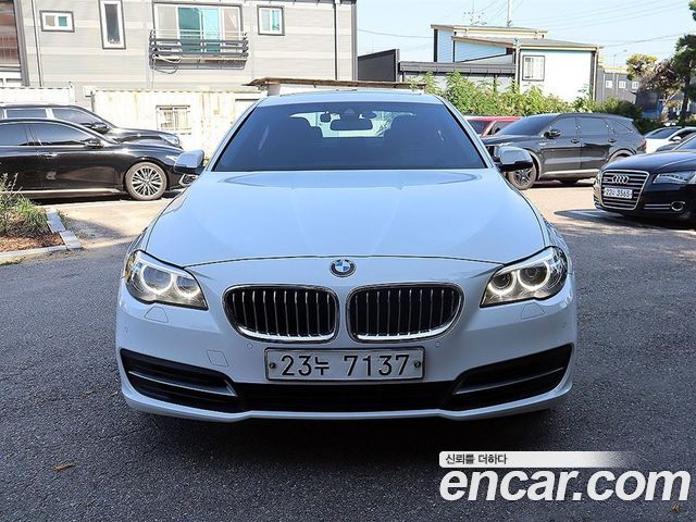 BMW 5-Series 2014 — photo 1