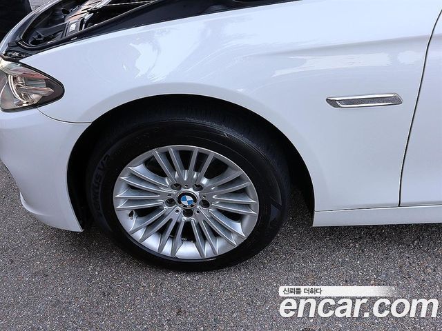 BMW 5-Series 2014 — photo 18