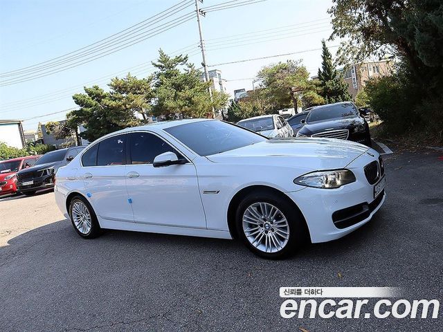 BMW 5-Series 2014 — photo 20