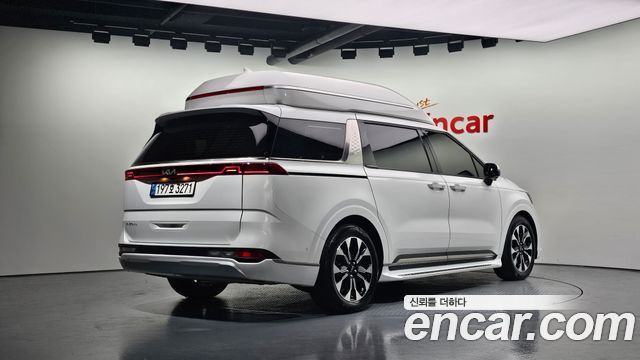 Kia Canival 2023 — photo 2