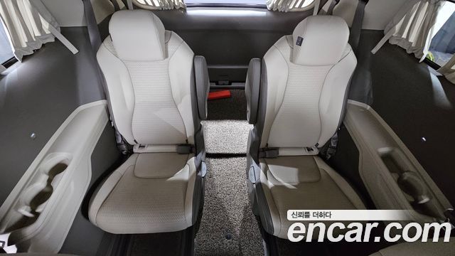 Kia Canival 2023 — photo 19