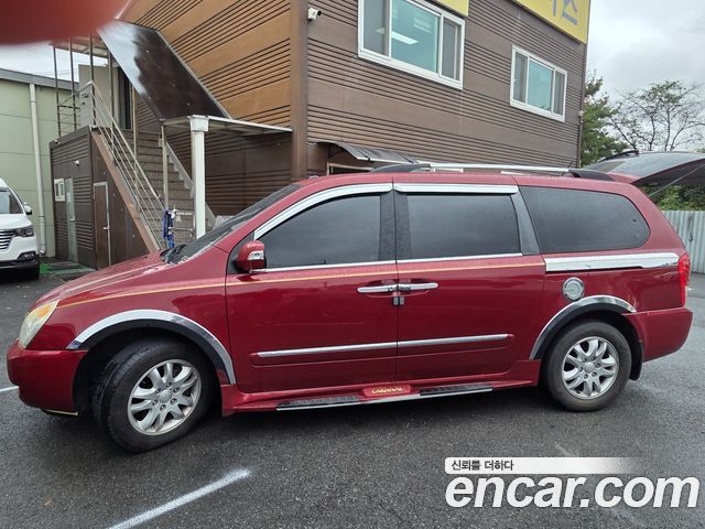 Kia Canival 2012 — photo 2
