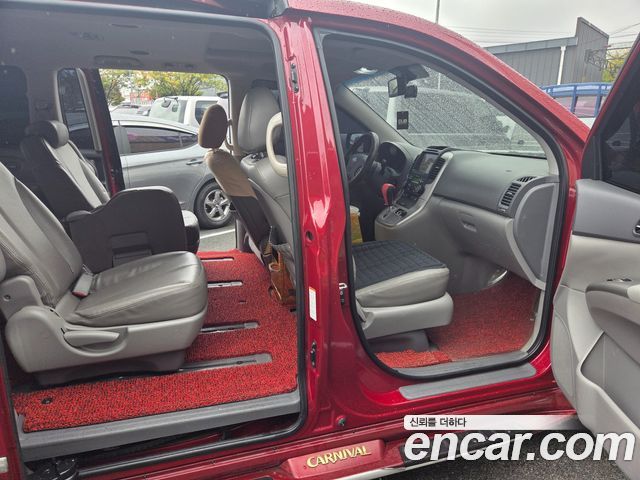 Kia Canival 2012 — photo 3