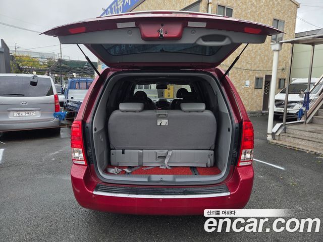 Kia Canival 2012 — photo 4