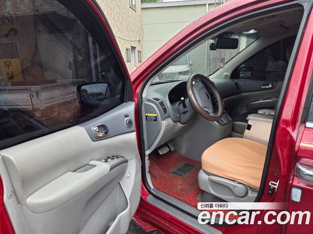 Kia Canival 2012 — photo 6