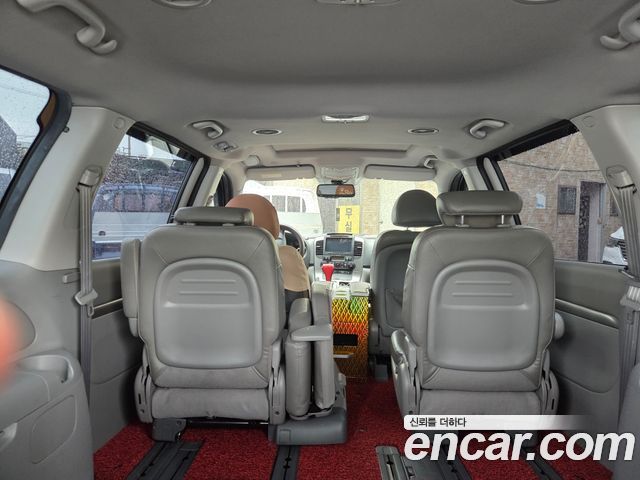 Kia Canival 2012 — photo 7