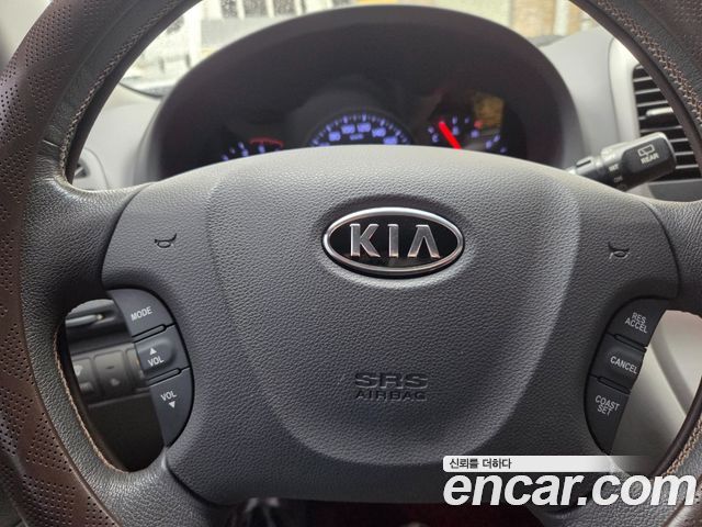 Kia Canival 2012 — photo 13
