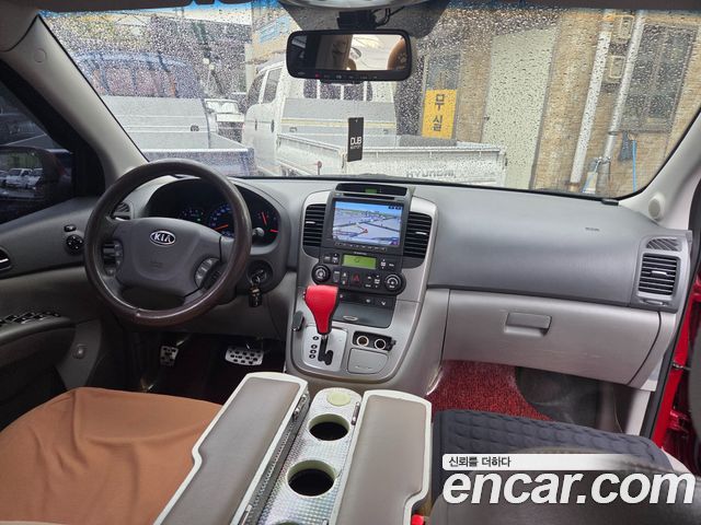 Kia Canival 2012 — photo 17