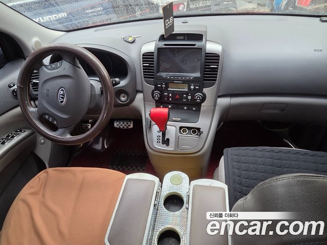 Kia Canival 2012 — photo 20