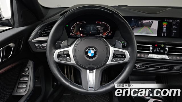 BMW 1-Series 2023 — photo 19