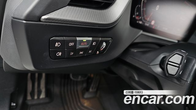 BMW 1-Series 2023 — photo 25