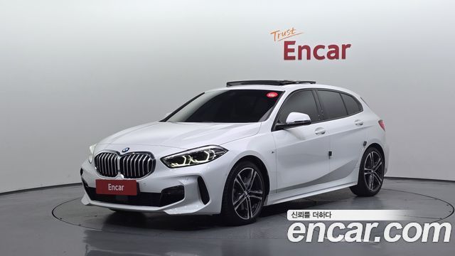 BMW 1-Series 2022 — photo 1