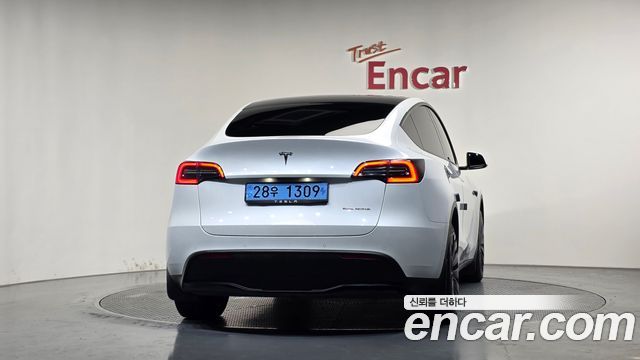 Tesla Model Y 2022 — photo 4