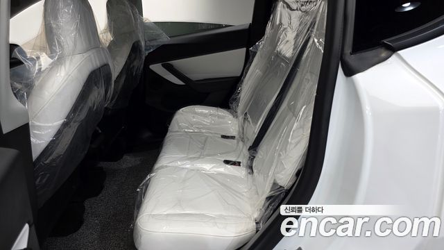 Tesla Model Y 2022 — photo 17
