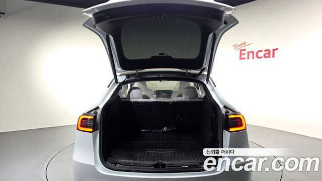 Tesla Model Y 2022 — photo 24