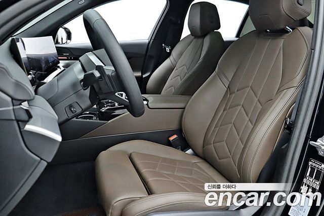 BMW 5-Series 2024 — photo 10