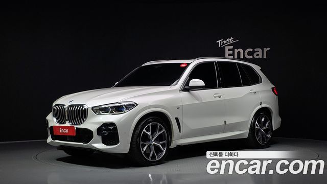BMW X5 2022 — photo 1