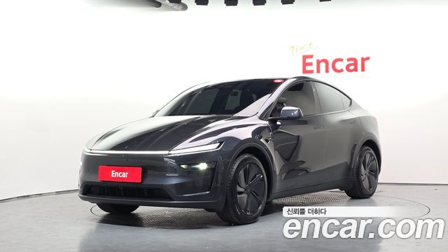 Tesla Model Y 2025 — photo 1
