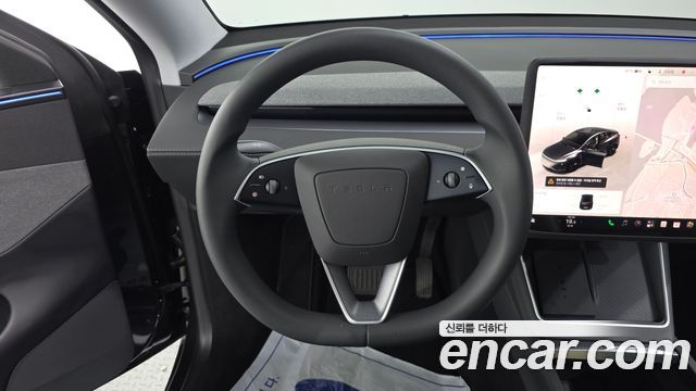 Tesla Model Y 2025 — photo 13