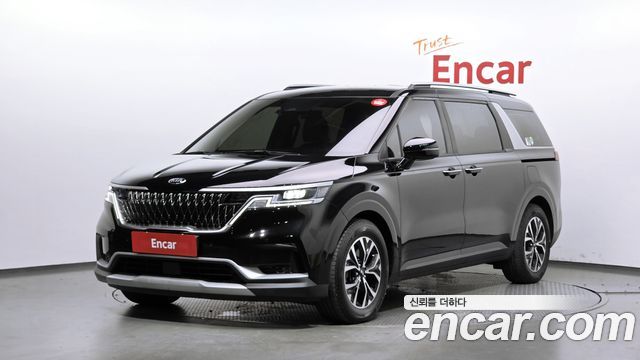 Kia Canival 2021 — photo 1