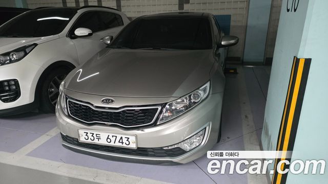 Kia K5 2013 — photo 1