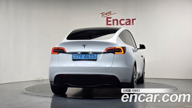 Tesla Model Y 2024 — photo 4