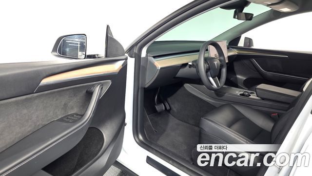 Tesla Model Y 2024 — photo 13