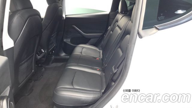 Tesla Model Y 2024 — photo 17