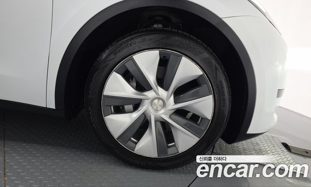 Tesla Model Y 2024 — photo 7