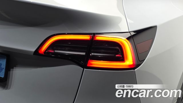 Tesla Model Y 2024 — photo 9
