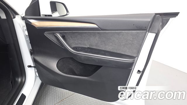 Tesla Model Y 2024 — photo 14