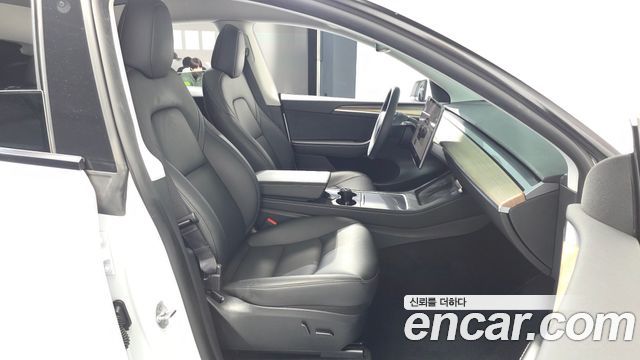 Tesla Model Y 2024 — photo 16