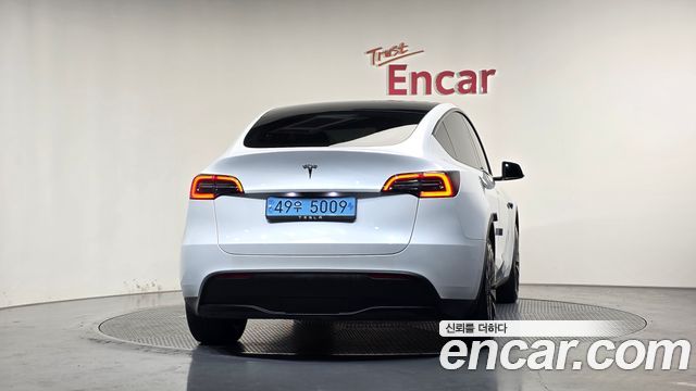 Tesla Model Y 2024 — photo 4