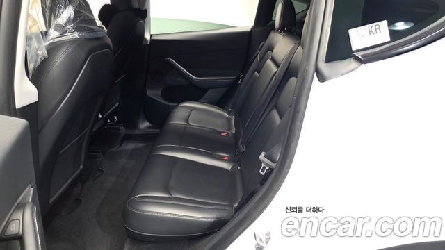 Tesla Model Y 2024 — photo 17