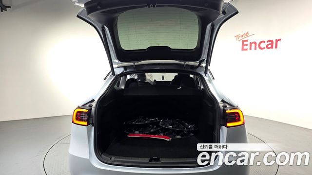 Tesla Model Y 2024 — photo 24